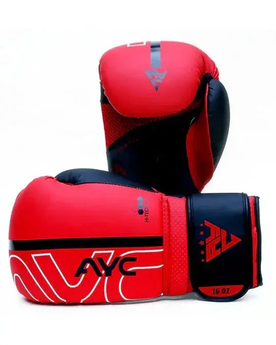 Red and black boxing gloves with wrist strap, 16 oz size, bold modern design