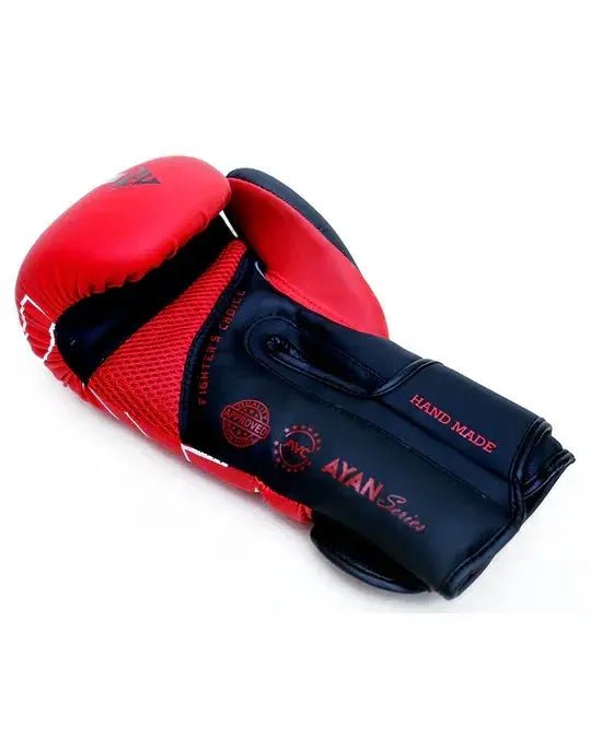 Red and black handmade boxing glove with mesh panel, labeled AYAN Series, for training.
