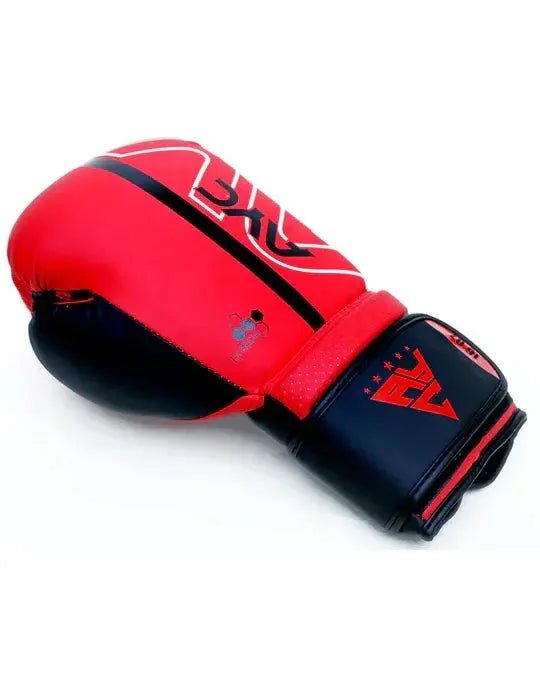 Red and black boxing glove with wrist strap and printed logos, isolated on white background