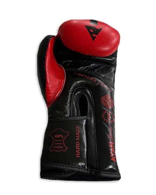 Black and red leather boxing glove with handmade label and thumb protection