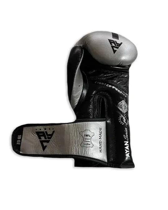 Black and silver leather boxing glove with visible brand logos and wrist strap, 10 oz size.