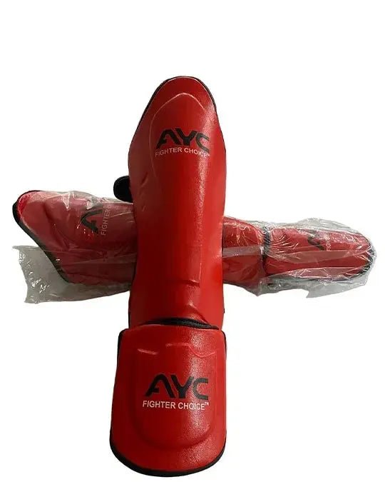 Red martial arts shin guards with ANC Fighter Choice logo, protective gear for kickboxing
