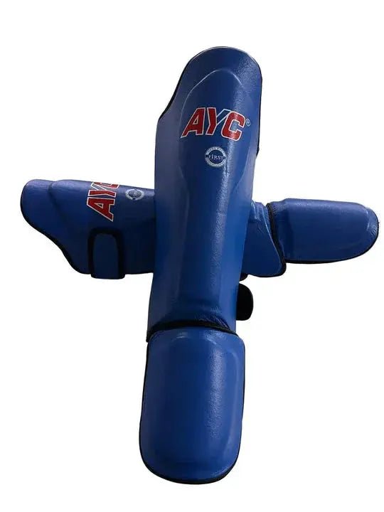 Blue martial arts shin and instep guards with AYC logo, protective gear for sports training